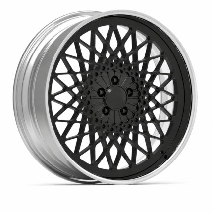 High-end 3/4 perspective view of 24-inch staggered mesh wheel for Chevy Corvette, featuring a gloss black face, polished lip, and a logo-free center cap, set against a pure white background.