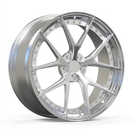 High-end 3/4 perspective of a silver V-spoke 2-piece forged wheel, highlighting the aggressive concave profile and polished lip on a pure white background.