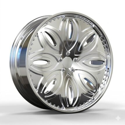 High-end 3/4 perspective of an oversized 26x9.5 custom classic car wheel, showcasing the brilliant vacuum chrome electroplated finish and intricate petal cutouts on a pure white background.