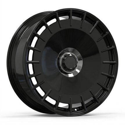 High-end 3/4 perspective of a custom gloss black forged aero disc wheel for Mercedes G-Class, featuring a distinctive 20-spoke outer ring and faux center-lock design.