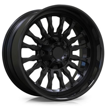 High-end 3/4 perspective of a premium aftermarket off-road wheel, showcasing the contrast between the matte black center and gloss black lip on a pure white background.